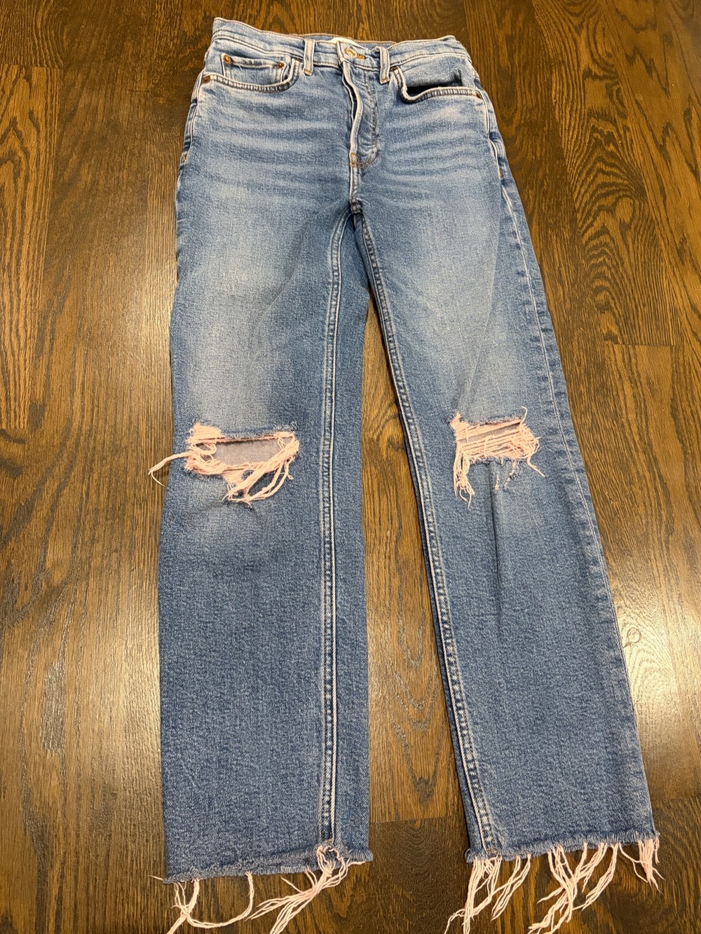 Re/Done Straight-Leg Jeans with Pink Tinted Knee Rips and Frayed Hem